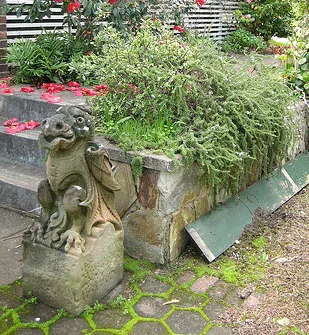 Garden Gargoyle bookended by Ellie Gee